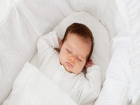 When Can Your Baby Sleep With a Pillow or Blanket?
