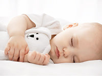 When Do Babies Sleep Through the Night?