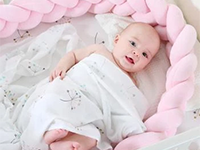 What is The Material of The Crib Bumper Pads?