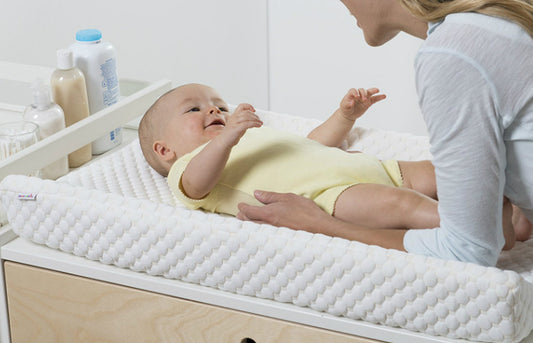How To Change A Diaper On Changing Pad Cover