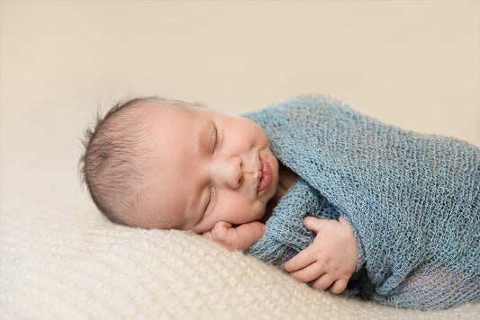 When Do You Drop Your Crib Mattress and Crib Sheets